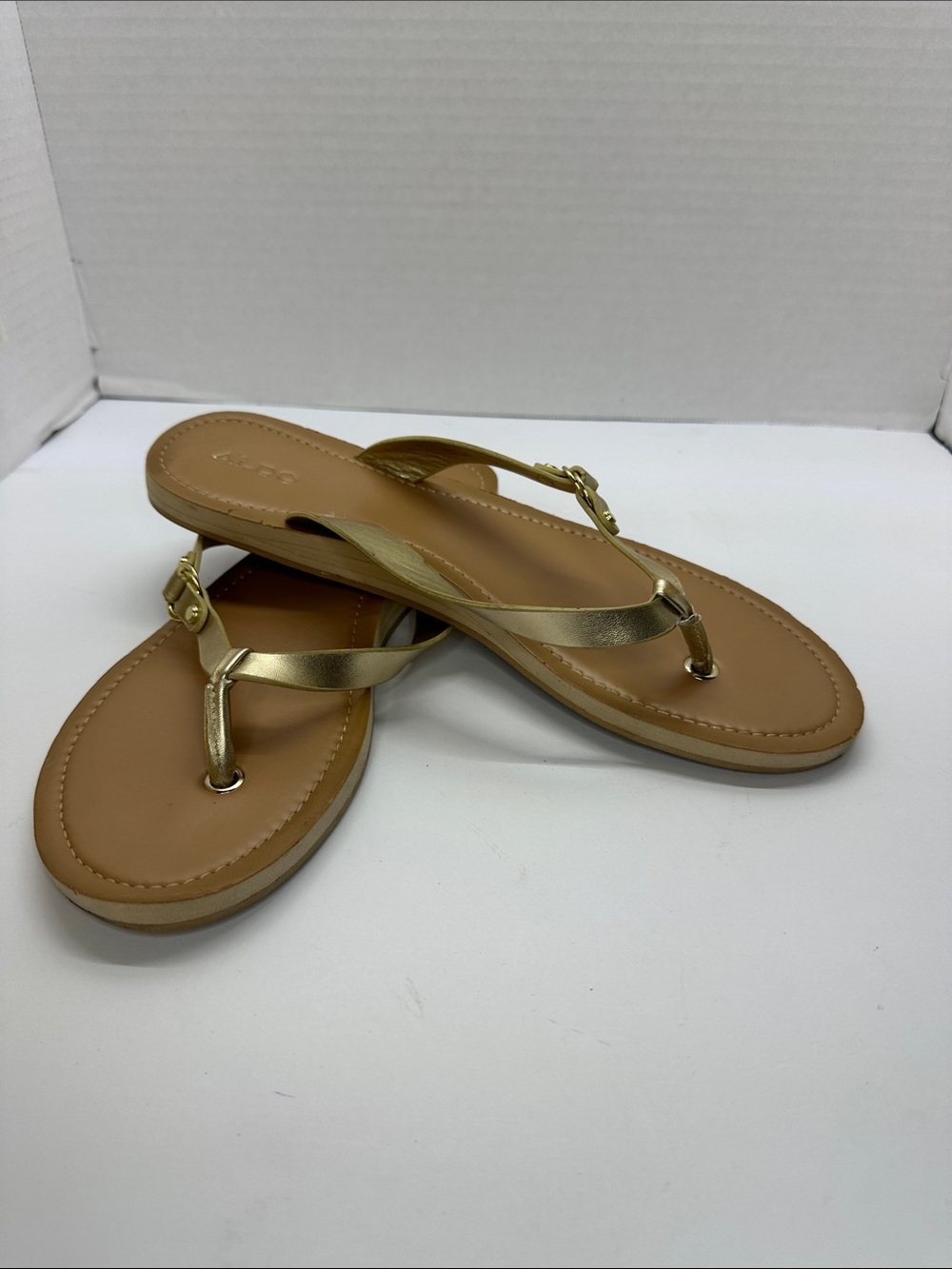 Aldo Gold Metallic T-Strap Sandals with Tan Footbed
